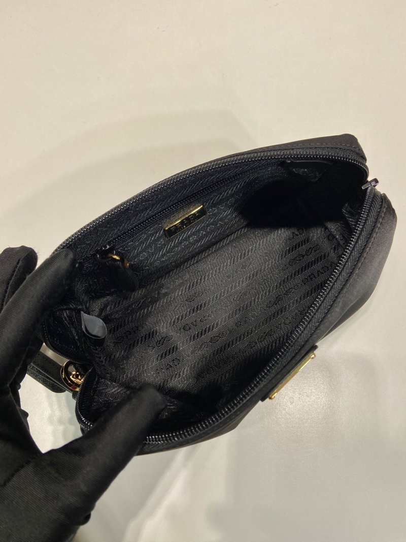 Pra*a clutch bags